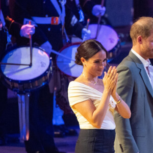 Le prince Harry et Meghan Markle lors de la cérémonie d'ouverture des Invictus Games 2020 à La Haye, le 16 avril 2022. 