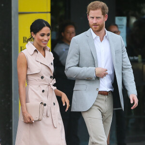 Le prince Harry et sa femme Meghan Markle arrivent à l'exposition commémorative du centenaire de la naissance de Nelson Mandela au centre Southbank à Londres le 17 juillet 2018.