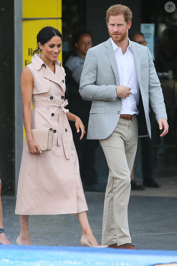 Le prince Harry et sa femme Meghan Markle arrivent à l'exposition commémorative du centenaire de la naissance de Nelson Mandela au centre Southbank à Londres le 17 juillet 2018.