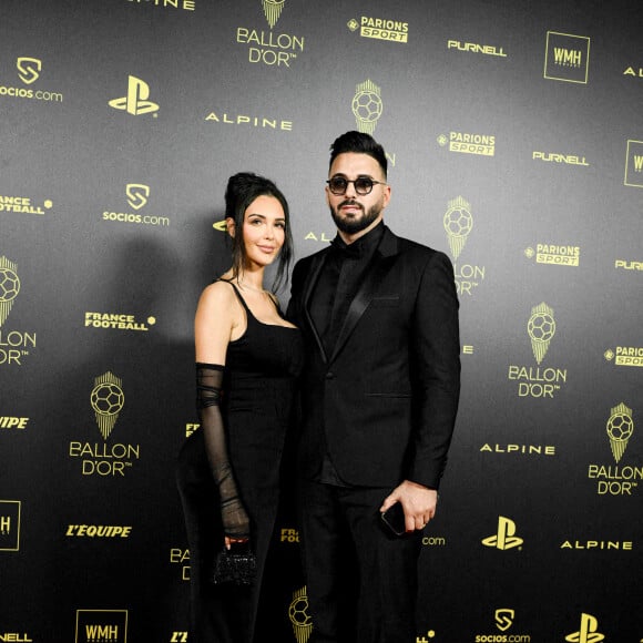 Nabilla (Benattia) et son mari Thomas Vergara au photocall de la 66ème cérémonie du Ballon d'Or au Théâtre du Chatelet à Paris le 17 octobre 2022.