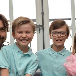 Exclusif - Henri Leconte, sa femme Florentine et leurs enfants Marylou, Ulysse et Jules lors d'un goûter de Pâques " Tout Chocolat " à l'Hôtel de Vendôme à Paris le 9 avril 2014.