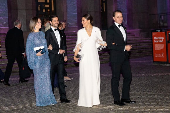 La princesse Sofia et le prince Carl Philip, la princesse Victoria et le prince Daniel de Suède lors d'une soirée de concert offerte au roi et à la reine de Suède à Stockholm, à l'occasion du voyage officiel du couple royal des Pays-Bas en Suède. Le 12 octobre 2022