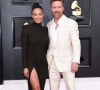 David Guetta et sa compagne Jessica - 64e édition des Grammy Awards au MGM Grand Garden à Las Vegas, le 3 avril 2022.