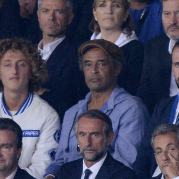 Yannick Noah et son fils Joalukas, Jean-Claude Blanc, Nicolas Sarkozy - People en tribunes du match de football en ligue 1 Uber Eats : Le PSG (Paris Saint-Germain) remporte la victoire 2-1 contre Lyon au Parc des Princes à Paris le 19 septembre 2021.