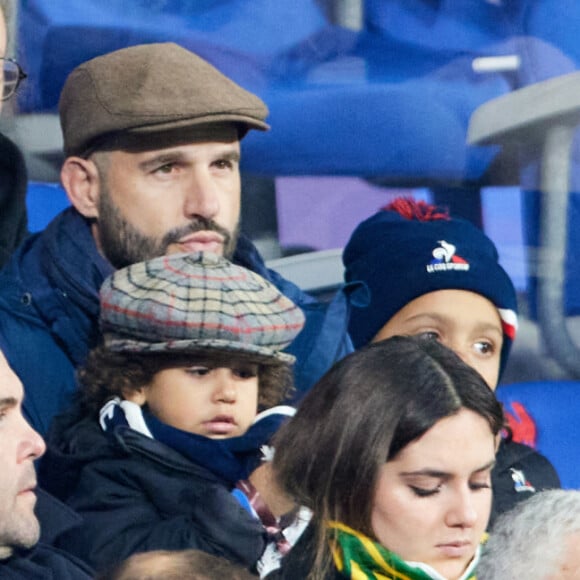 Frédéric Michalak, sa femme Cindy Michalak et leurs enfants Hugo Michalak, Jasen Michalak - Personnalités dans les tribunes du match de rugby "France vs Australie" au Stade de France à Paris.