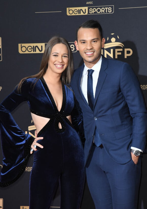 Mohamed Bouhafsi et sa compagne au photocall de la 28ème cérémonie des trophées UNFP (Union nationale des footballeurs professionnels) au Pavillon d'Armenonville à Paris, France, le 19 mai 2019. © Coadic Guirec/Bestimage.