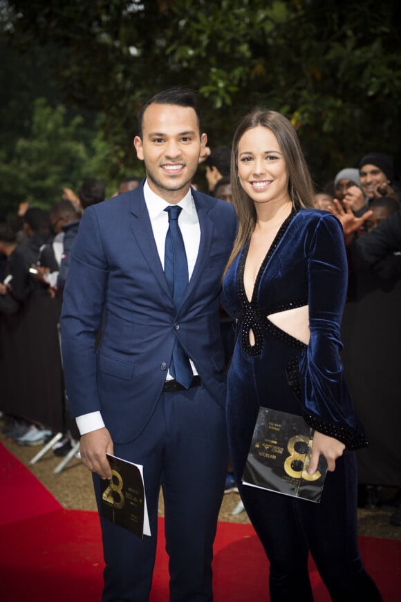 Mohamed Bouhafsi et sa compagne arrivent à la 28ème cérémonie des trophées UNFP (Union nationale des footballeurs professionnels) au Pavillon d'Armenonville à Paris, France, le 19 mai 2019.