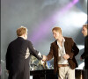 Sir Elton John avec les princes William et Harry en 2007 lors du concert en hommage à Lady Diana à Wembley