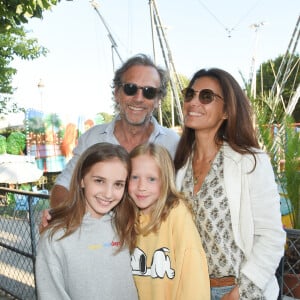 Stéphane Freiss, sa femme Ursula Freiss et leur fille Bianca - Soirée d'inauguration de la 35ème fête foraine des Tuileries au Jardin des Tuileries à Paris, le 22 juin 2018. © Coadic Guirec/Baldini/Bestimage.