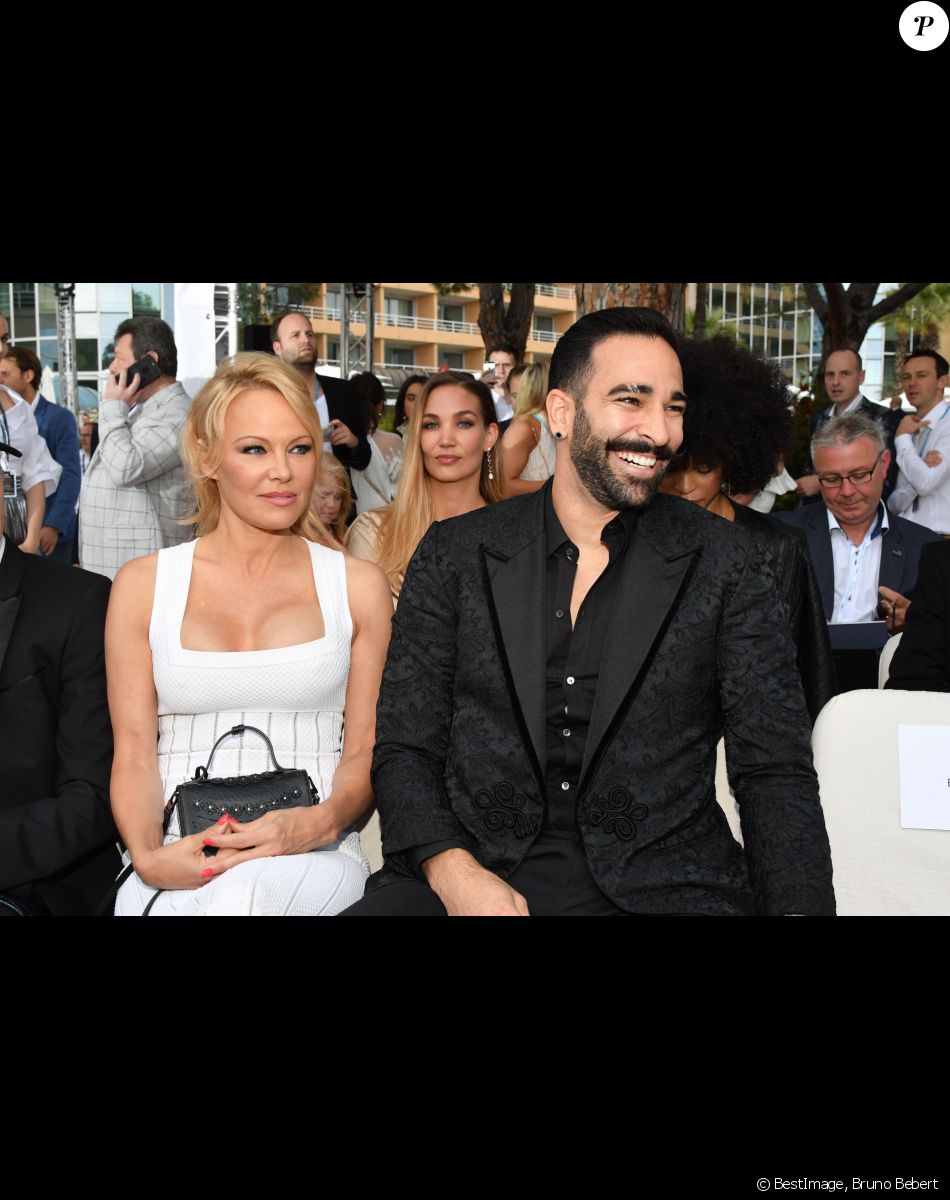 Pamela Anderson et son compagnon Adil Rami lors de la soirée Amber Lounge Monaco 2019 au profit de la fondation de Jackie Stewart "Race Against Dementia" à l'hôtel Méridien Beach Plaza à Monaco, le 24 mai 2019. © Bruno Bebert / Bestimage