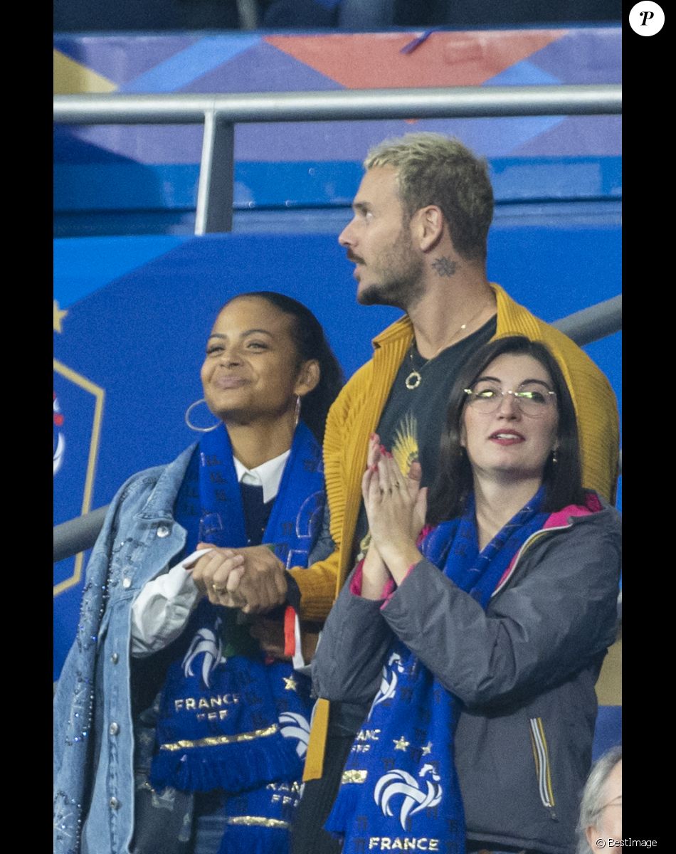 M. Pokora (Matt Pokora), sa femme Christina Milian assistent au match de la 5ème et avant-dernière journée de Ligue des nations entre la France et l'Autriche (2-0) au Stade de France à Saint-Denis le 22 septembre 2022.