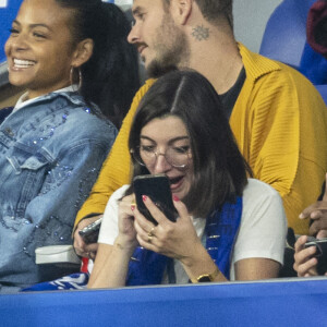 M. Pokora (Matt Pokora), sa femme Christina Milian assistent au match de la 5ème et avant-dernière journée de Ligue des nations entre la France et l'Autriche (2-0) au Stade de France à Saint-Denis le 22 septembre 2022. 