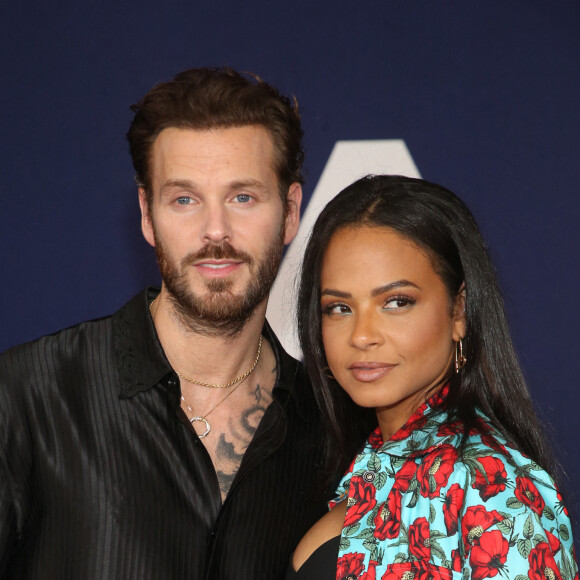 Matt Pokora et sa femme Christina Milian au photocall lors de la première du film "Ambulance" à Los Angeles le 4 avril 2022. 