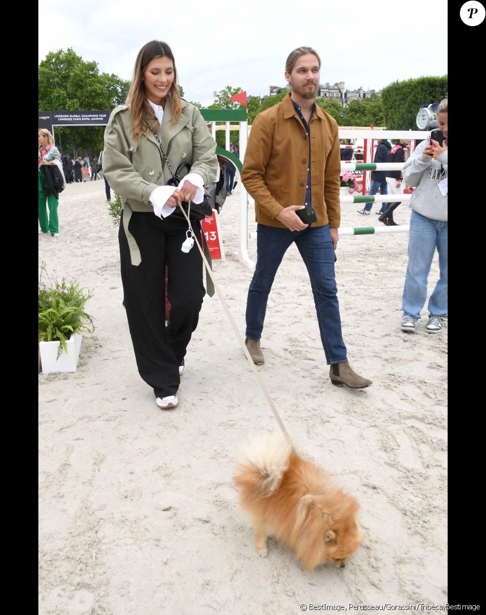 Camille Cerf (Miss France 2015 et Ambassadrice du LGCT-LPEJ 2022), son compagnon Théo Fleury et le chien Romeo - 8ème édition du "Longines Paris Eiffel Jumping" au Champ de Mars à Paris, le 25 juin 2022. © Perusseau/Gorassini/Tribeca/Bestimage
