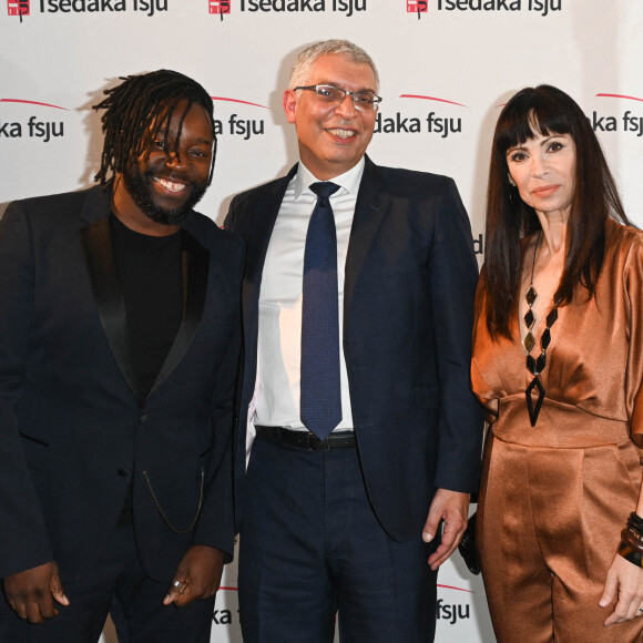 Exclusif - Sly Johnson, Arié Flack (Président de la Tsédaka FSJU) et Mathilda May - Soirée caritative des parrains de l'Appel national pour la Tsedaka au Pavillon d'Armenonville à Paris, le 27 novembre 2022. © Coadic Guirec/Bestimage