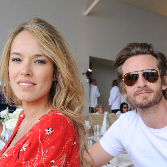 Philippe Lacheau et sa compagne Elodie Fontan au Longines Paris Eiffel Jumping au Champ de Mars à Paris, le , le 7 juillet 2019.