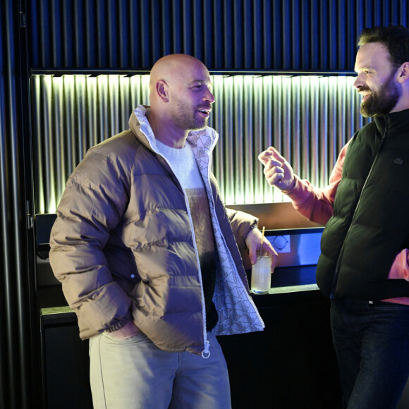 Exclusif - Franck Gastambide et Alban Lenoir à la Winter Party au rooftop Skybar Paris à l'hôtel Pullman Montparnasse à Paris le 6 décembre 2022. © Rachid Bellak / Bestimage 