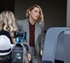 Amber Heard sort du tribunal lors de son procès intenté par son ex-mari Johnny Depp à Fairfax, Virginie, Etats-Unis, le 26 mai 2022. 