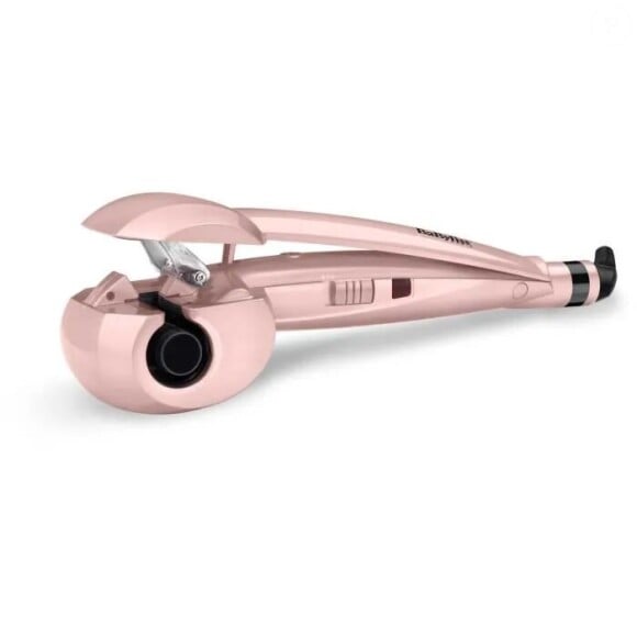 Des boucles utra définies et qui préserve vos cheveux, c'est ce que promet le fer à boucler Curl Secret Rosh Blush BaByliss