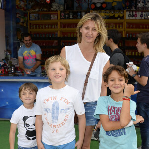 Sarah Lavoine avec ses fils Milo, Roman et un ami - Inauguration de la Fête des Tuileries à Paris le 26 juin 2015.