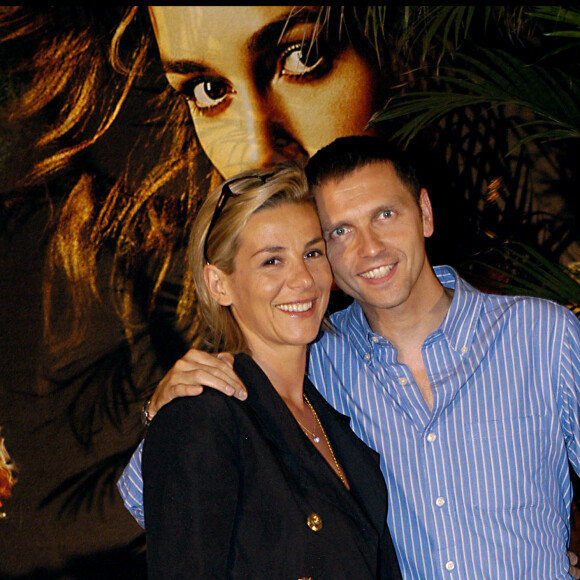 Laurence Ferrari et Thomas Hugues lors de la première de "Pirates des Caraïbes, Dead Man's Chest" à Paris le 6 juillet 2006.