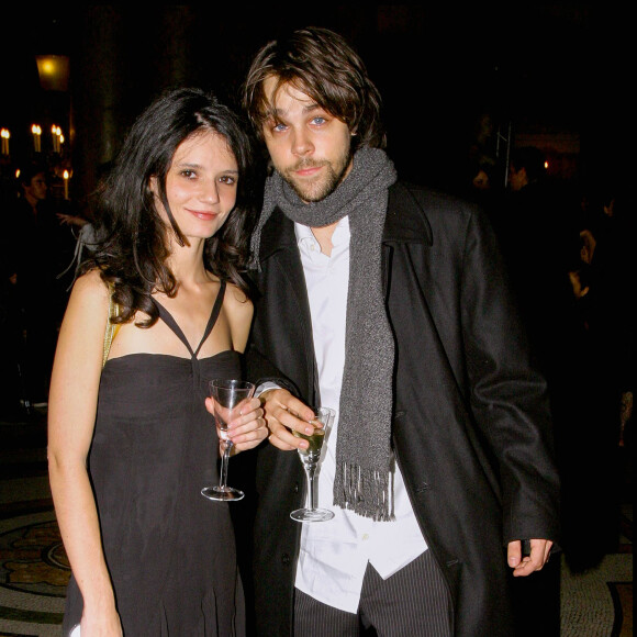 Salomé Lelouch et Arthur Jugnot a la soiree pour l'avant premiere du film ' Arsene Lupin' a l'Opera de Paris.