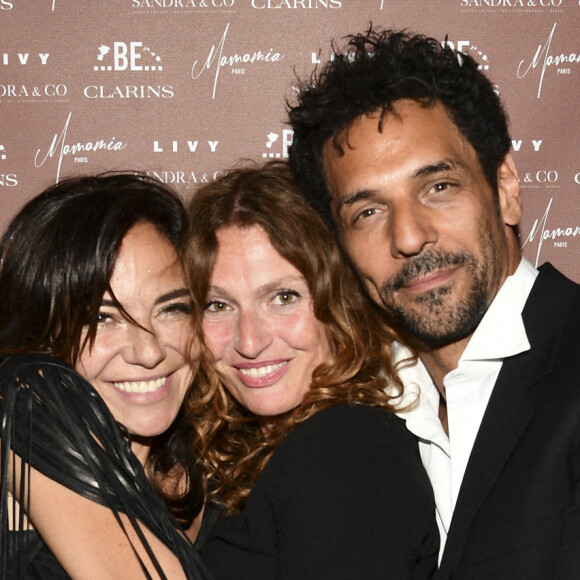 Exclusif - Sandra Sisley (robe Jitrois), Aurélie Saada et Tomer Sisley - Soirée du 49ème anniversaire de Sandra Sisley (né le 25 avril) et les 6 ans de "Retrouvite" avec son mari Tomer au restaurant Mamamia à Paris le 12 mai 2022.© Pierre Perusseau/Bestimage 
