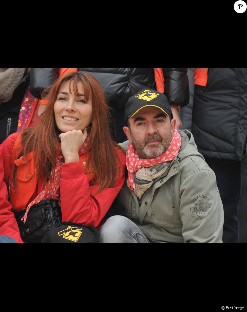Bruno Solo et sa femme Veronique - Depart du Rallye Aicha des Gazelles du Maroc sur la place du Trocadero a Paris le 16 mars 2013.