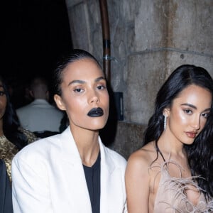 Tina Kunakey et Amina Muaddi au frontrow du défilé de mode Haute-Couture "Valentino" lors de la fashion week de Paris. Le 25 janvier 2023 © Olivier Borde / Bestimage 