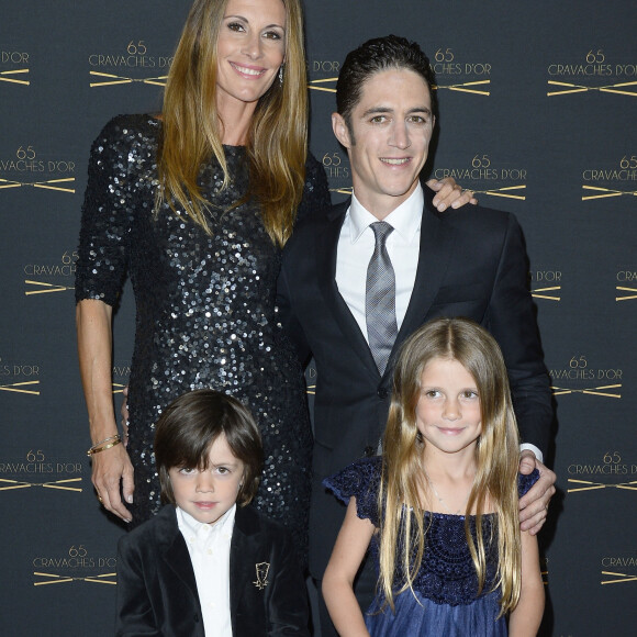 Sophie Thalmann, son mari Christophe Soumillon et leur enfants Charlie et Mika - 65ème édition des Cravaches d'Or au Théâtre des Champs-Elysées à Paris le 14 mars 2014.