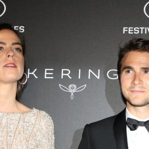 Anouchka Delon et son compagnon Julien Dereims - Photocall de la soirée Kering "Women In Motion Awards", Place de la Castre, lors du 72ème Festival International du Film de Cannes. Le 19 mai 2019 © Denis Guignebourg / Bestimage 