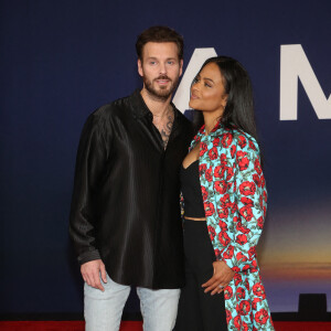 Matt Pokora et sa femme Christina Milian au photocall lors de la première du film "Ambulance" à Los Angeles le 4 avril 2022. 