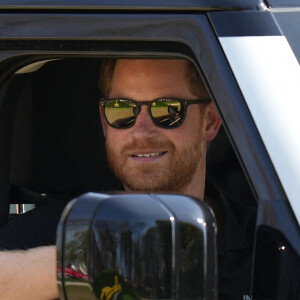 Le prince Harry et Meghan Markle lors du "Land Rover Challenge" au premier jour des Invictus Games 2020 à La Haye, le 16 avril 2022. 