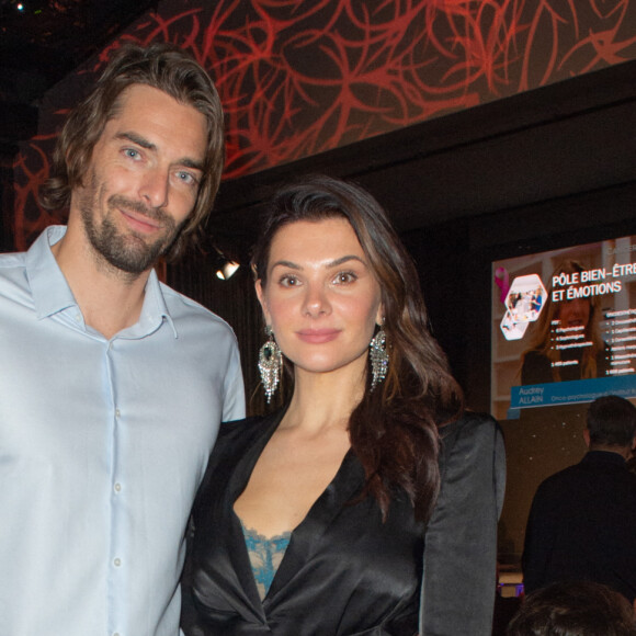 Exclusif - Le nageur Camille Lacourt et sa compagne Alice Detollenaere lors de la soirée de gala de l'Institut Rafaël, maison de l'après Cancer, au Pavillon Gabriel à Paris le 13 décembre 2021. © Erez Lichtfeld / Bestimage 