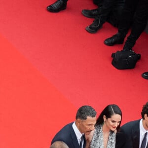 Il aurait fait passer le message à Louis Garrel qu'il n'y est pour rien. 
Jean-Claude Pautot, Roschdy Zem, Noémie Merlant, Louis Garrel, Anouk Grinberg, Anne-Dominique Toussaint - Montée des marches du film " L'Innocent " lors du 75ème Festival International du Film de Cannes. Le 24 mai 2022 © Pool/ Bestimage 