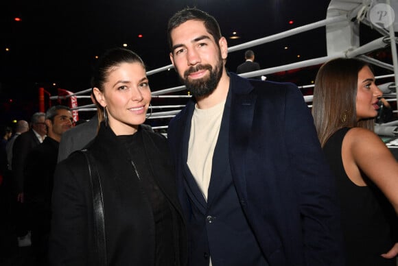 Nikola Karabatic et sa femme Géraldine Pillet - Les célébrités assistent au combat international de boxe poids lourd de 10 rounds opposant le français Tony Yoka au français d'origine camerounaise Carlos Takam au Zénith de Paris, France, le 11 mars 2023. © Veeren/Bestimage 