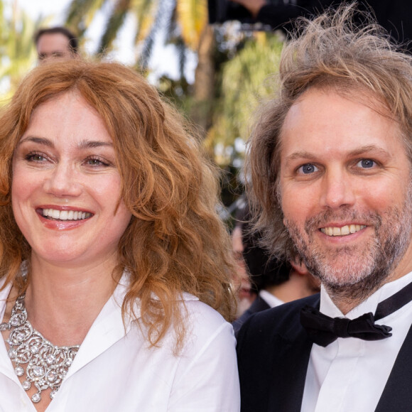 Marine Delterme, quant à elle, a refait sa vie avec l'auteur et réalisateur Florian Zeller.
Marine Delterme et son mari Florian Zeller - Montée des marches du film " Triangle of Sadness (Sans filtre) " lors du 75ème Festival International du Film de Cannes. Le 21 mai 2022 © Olivier Borde / Bestimage 