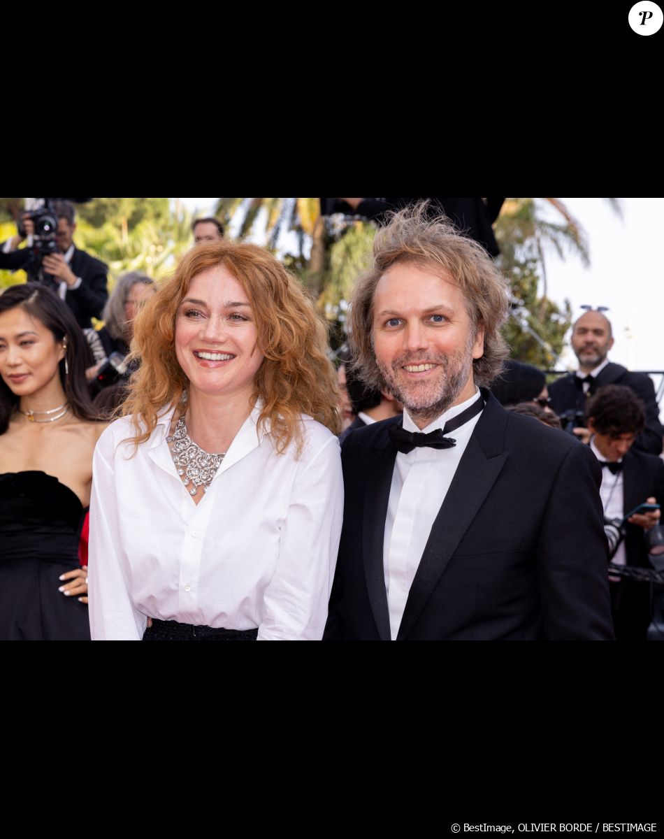Marine Delterme, quant à elle, a refait sa vie avec l'auteur et réalisateur Florian Zeller.
Marine Delterme et son mari Florian Zeller - Montée des marches du film " Triangle of Sadness (Sans filtre) " lors du 75ème Festival International du Film de Cannes. Le 21 mai 2022 © Olivier Borde / Bestimage