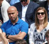 A noter qu'un an plus tard, les deux tourtereaux étaient de nouveaux photographiés dans les tribunes du tournoi.
Eric Judor et sa compagne - People dans les tribunes des Internationaux de France de tennis de Roland Garros à Paris. Le 28 mai 2015.