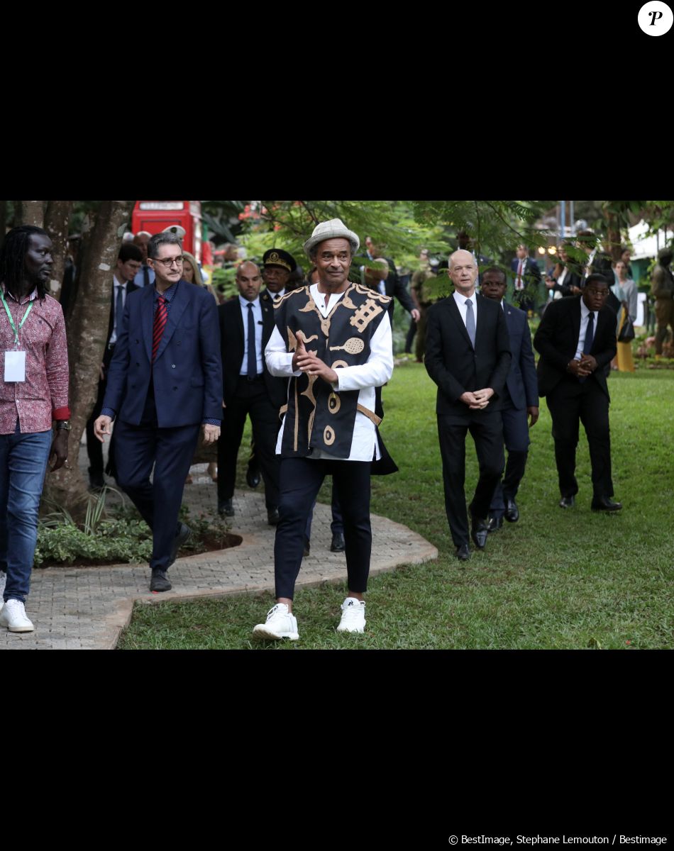 Rentré d'un voyage en Polynésie française, c'est au Cameroun qu'il a contracté le paludisme et se repose.
Le président français Emmanuel Macron et Yannick Noah au village Noah pour un débat avec la société civile et un concert, Yaoundé, Cameroun, le 26 juillet 2022. Emmanuel Macron effectue une tournée africaine de trois jours au Cameroun, au Bénin et en Guinée-Bissau. © Stéphane Lemouton/Bestimage