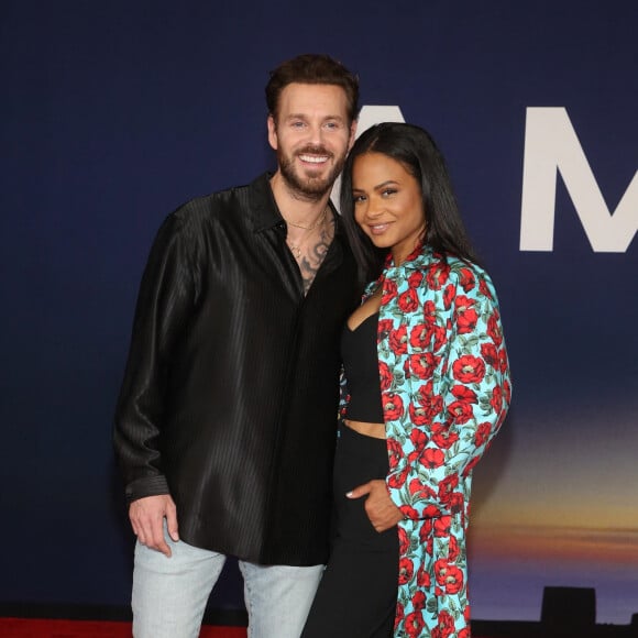 Matt Pokora et sa femme Christina Milian - Photocall lors de la première du film "Ambulance" à Los Angeles le 4 avril 2022. 