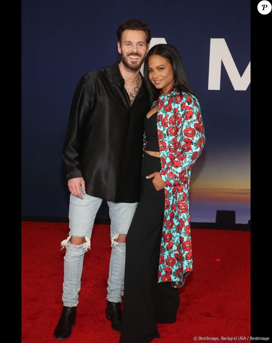 Matt Pokora et sa femme Christina Milian - Photocall lors de la première du film "Ambulance" à Los Angeles le 4 avril 2022.