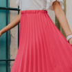 Comme Pink faites de la jupe longue plissée votre nouvel essentiel mode