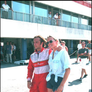 David Hallyday et Estelle Lefébure lors d'une course au Castellet le 24 juillet 1994