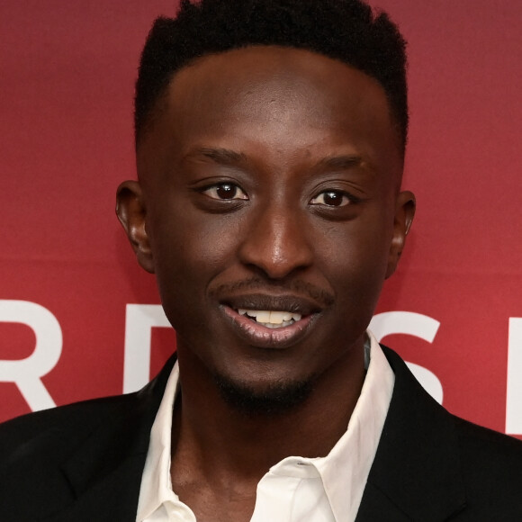 Raison pour laquelle il les imite si bien
Ahmed Sylla au photocall du dîner des nommés aux Cesar 2023 au Fouquet's à Paris le 6 février 2023. © Federico Pestellini / Panoramic / Bestimage 