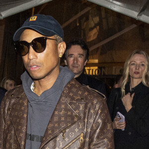 Exclusif - Pharrell Williams et son fils Rocket Ayer, le chef Jean Imbert, Antoine Arnault et Delphine Arnault - Les célébrités au concert de Jay Z à la fondation Louis Vuitton à Paris, France, le 14 avril 2023. © Da Silva-Perusseau/Bestimage 