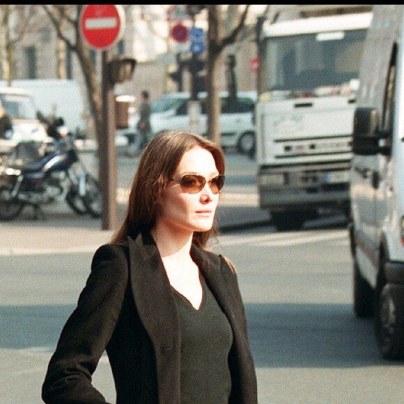 Carla Bruni et Raphael Enthoven aux obsèques de Jean-Luc Lagardère à l'église Saint-Francois Xavier à Paris.