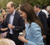 Elle avait la combinaison complète 
Le prince William, prince de Galles, et Catherine (Kate) Middleton, princesse de Galles, à la rencontre des membres du public participant au pique-nique du couronnement du roi sur la longue marche du parc du château de Windsor, Royaume Uni, le 7 mai 2023. 