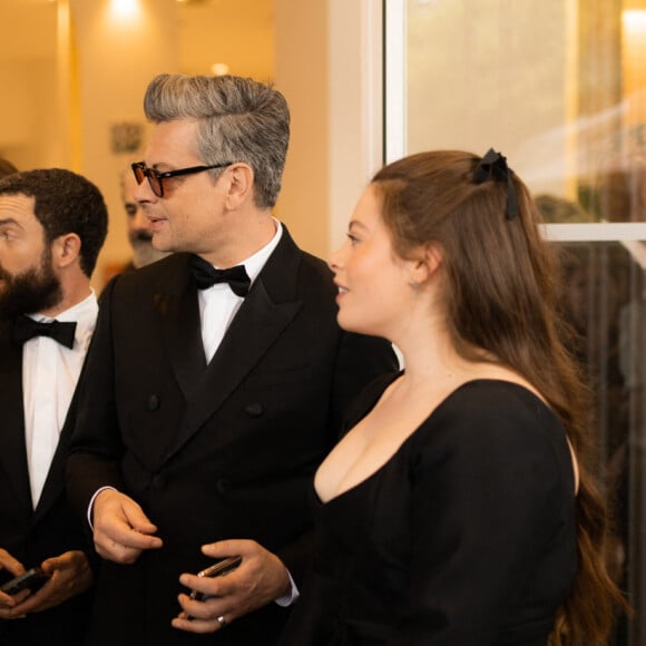 Elle a été défendue par sa tante, qui a fait passer un long message.
Orelsan, Guillaume Gouix, Benjamin Biolay et sa fille Anna - Personnalités à l'hôtel Martinez avant la montée des marches du film Indiana Jones et le cadran de la destinée (Indiana Jones and the Dial of destiny) lors du 76ème Festival International du Film de Cannes le 18 mai 2023. © Tiziano Da Silva / Pierre Perusseau / Bestimage 