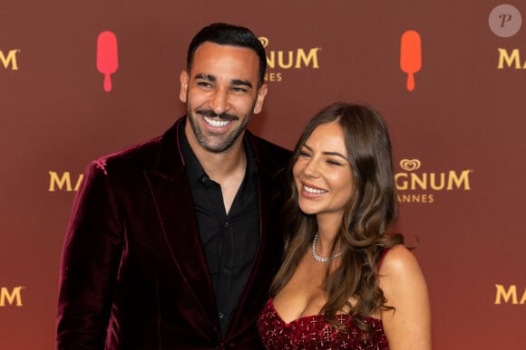 Adil Rami et sa compagne Léna Guillou - Soirée sur la plage Magnum lors du 76e Festival International du Film de Cannes le 22 mai 2023. © Philippe Baldini/Bestimage